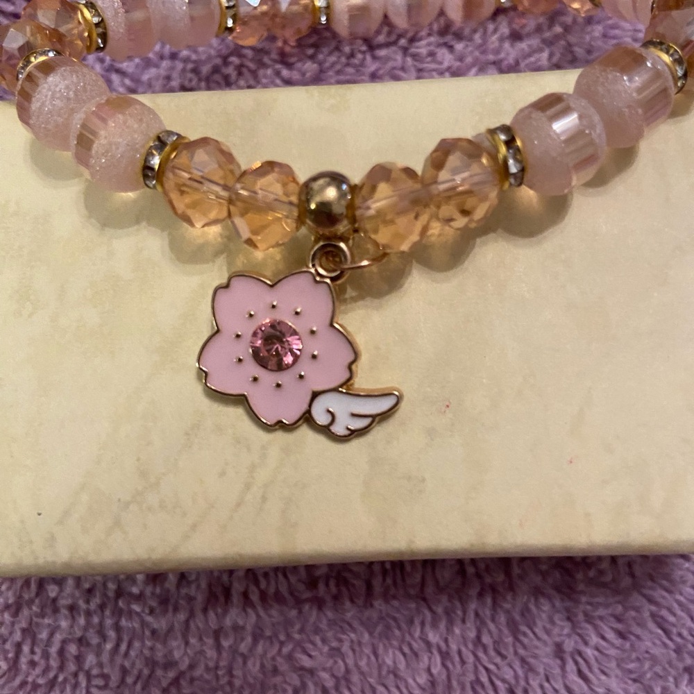 Children’s beaded bracelet approximately 3”, pink